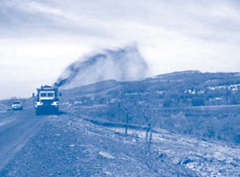 Figure 1. An aerospread truck was used to spray biosolids-based amendment onto soil across the former smelting area of Blue Mountain�s north slope.