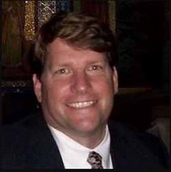 A photograph of Gerard (Jerry) Aarons, PG, CHG