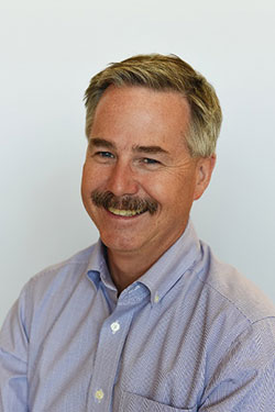 A photograph of Justin Teeguarden, Ph.D.