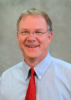 A photograph of Mark Bricka