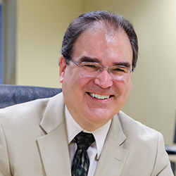 A photograph of Cesar Bandera, Ph.D