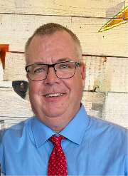 A photograph of Dr. Charles Partridge
