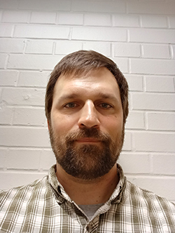 A photograph of James Hill, PhD