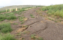 erosion at the capped landfills, primarily on access roads.