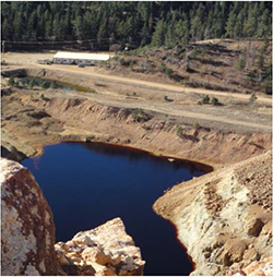 One of two onsite pits holding high-sulfate water at the Gilt Edge Mine site
