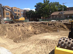 Figure 4. Diesel equipment such as a 250-horsepower excavator and 100-horsepower soil compacting roller operated under an idle restriction plan at the Whitney Young Library site.