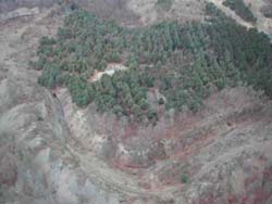 Hazardous highwall and highly acidic water impoundment at Dents Run Watershed site PA 3898 prior to reclamation. (Source: Pennsylvania Department of Environmental Protection, Bureau of Abandoned Mine Reclamation)